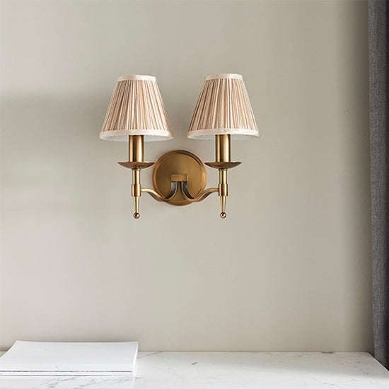 Stanford Twin Beige Shade Wall Light In Antique Brass